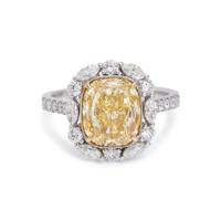 FANCY YELLOW DIAMOND AND DIAMOND RING
