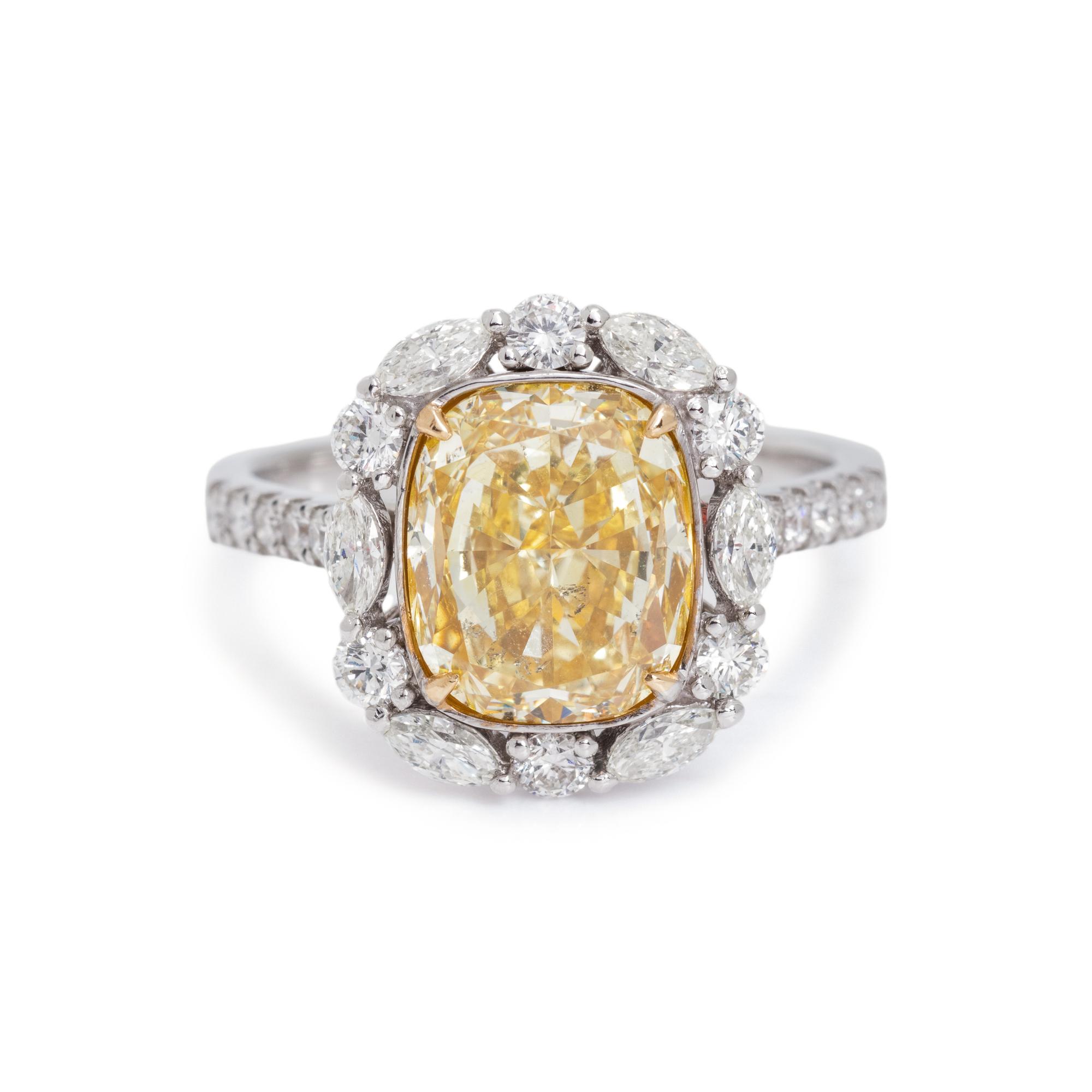 FANCY YELLOW DIAMOND AND DIAMOND RING