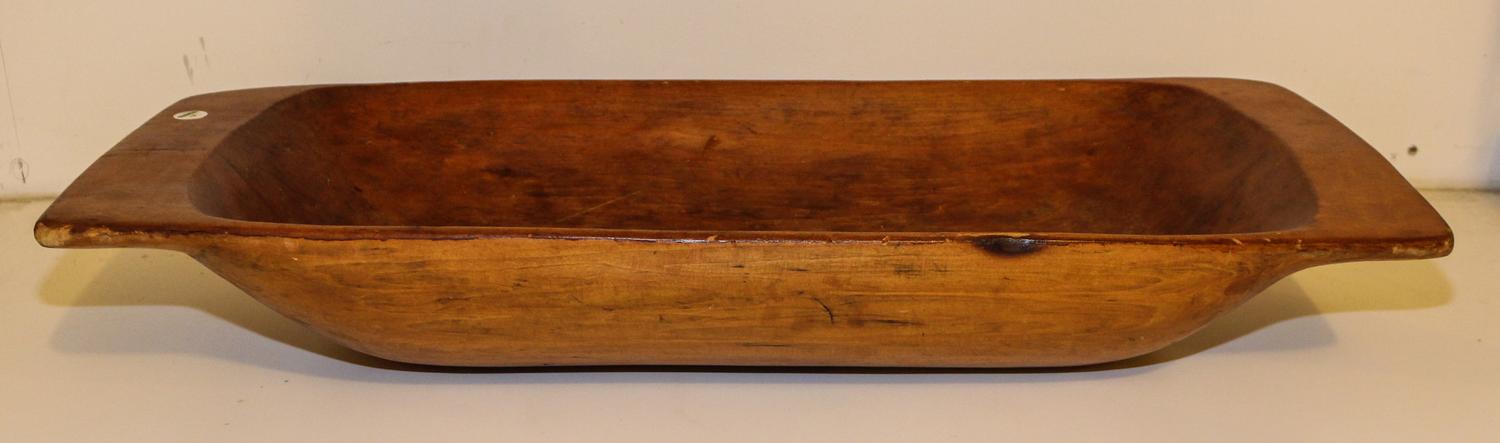 An American Carved Wood Dough Bowl. Width 37 inches.