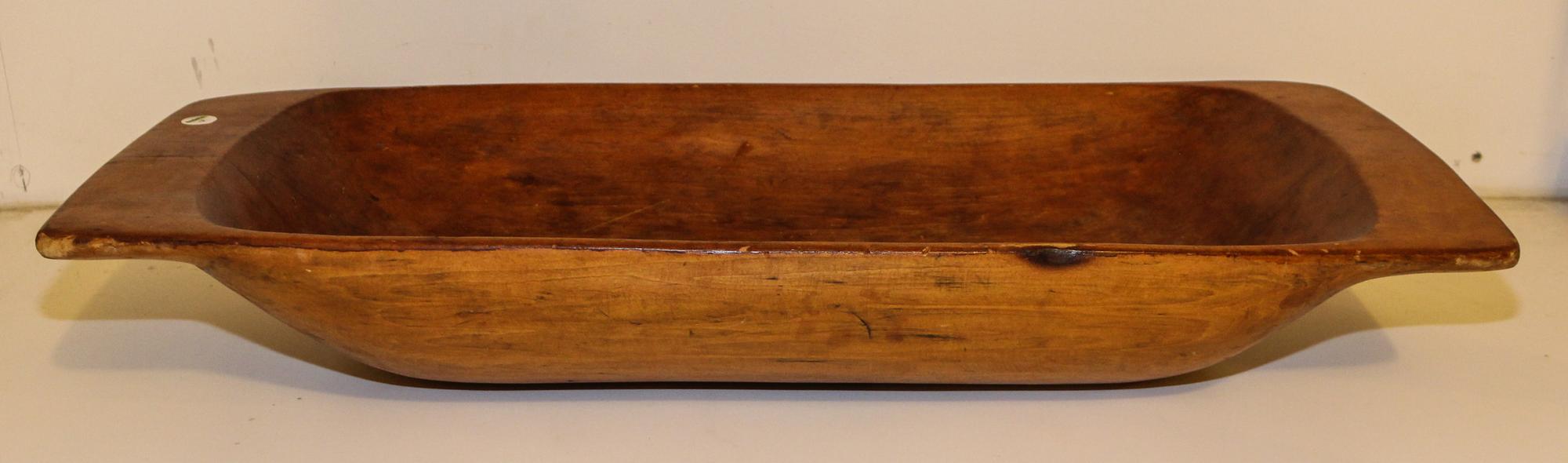 An American Carved Wood Dough Bowl. Width 37 inches.