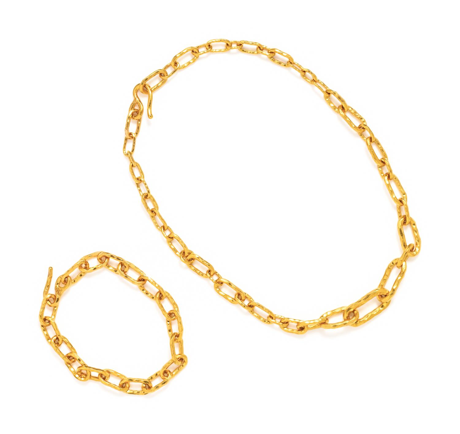 JEAN MAHIE, HIGH KARAT YELLOW GOLD SET