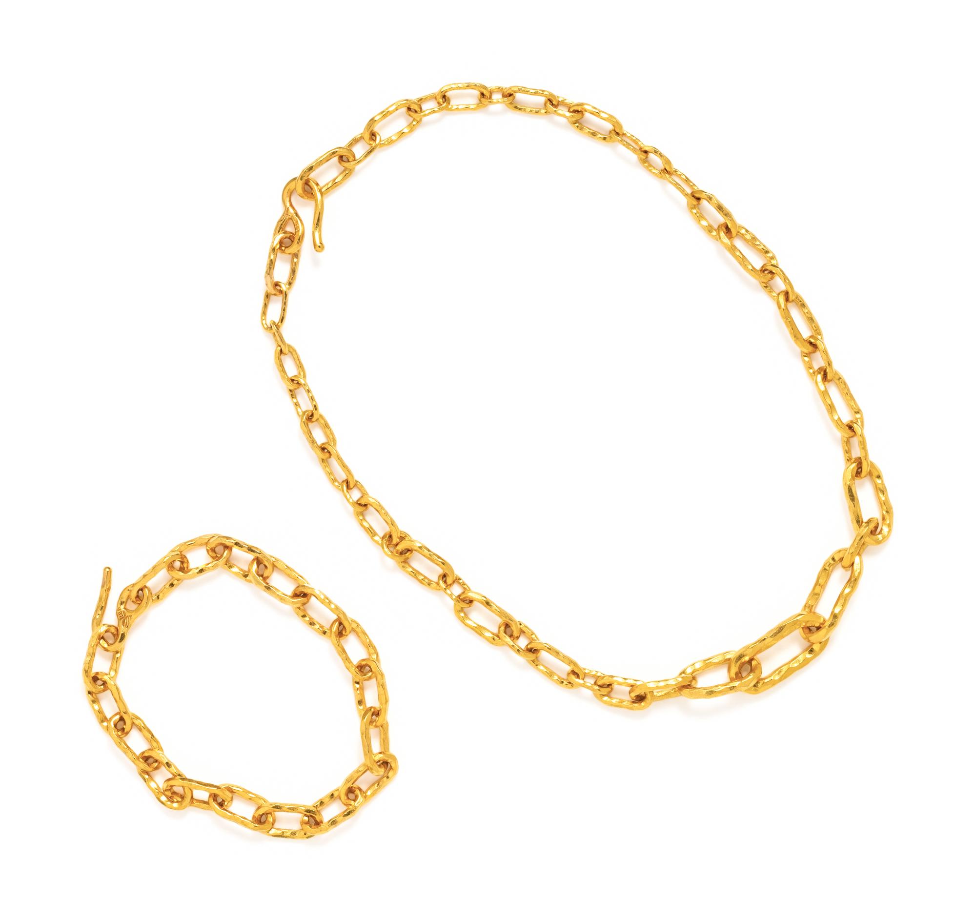 JEAN MAHIE, HIGH KARAT YELLOW GOLD SET