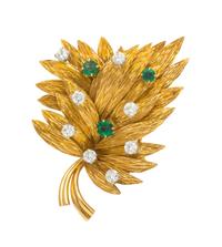 An 18 Karat Yellow Gold, Diamond and Emerald Leaf Brooch, Georges Lenfant, 16.50 dwts.