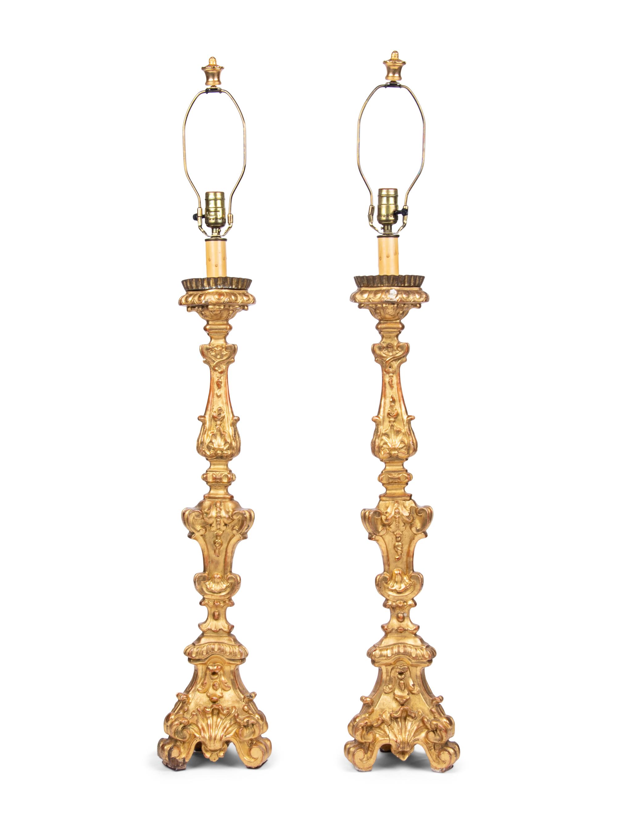 A Pair of Italian Giltwood Prickets Mounted as Lamps