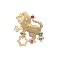 YELLOW DIAMOND, DIAMOND, EMERALD, AND RUBY LION BROOCH