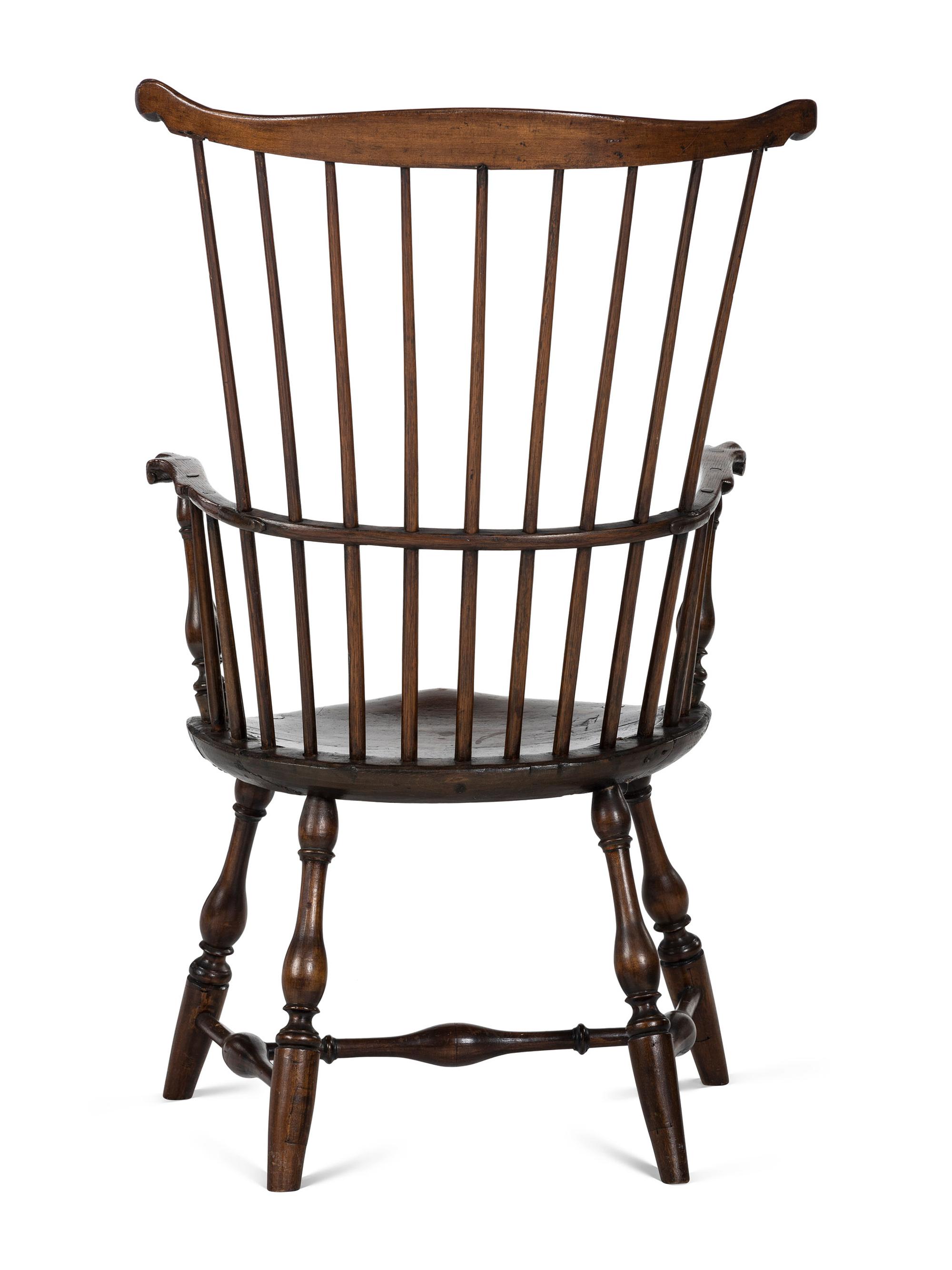 A Volute Carved Comb-Back Knuckle-Arm Windsor Armchair