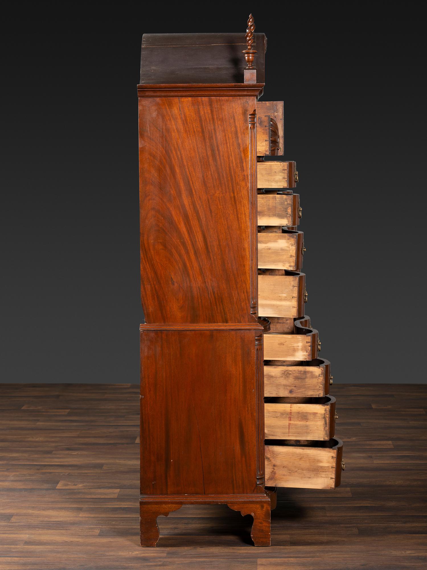A Chippendale Style Shell and Rosette Carved Mahogany Block Front Chest-On-Chest