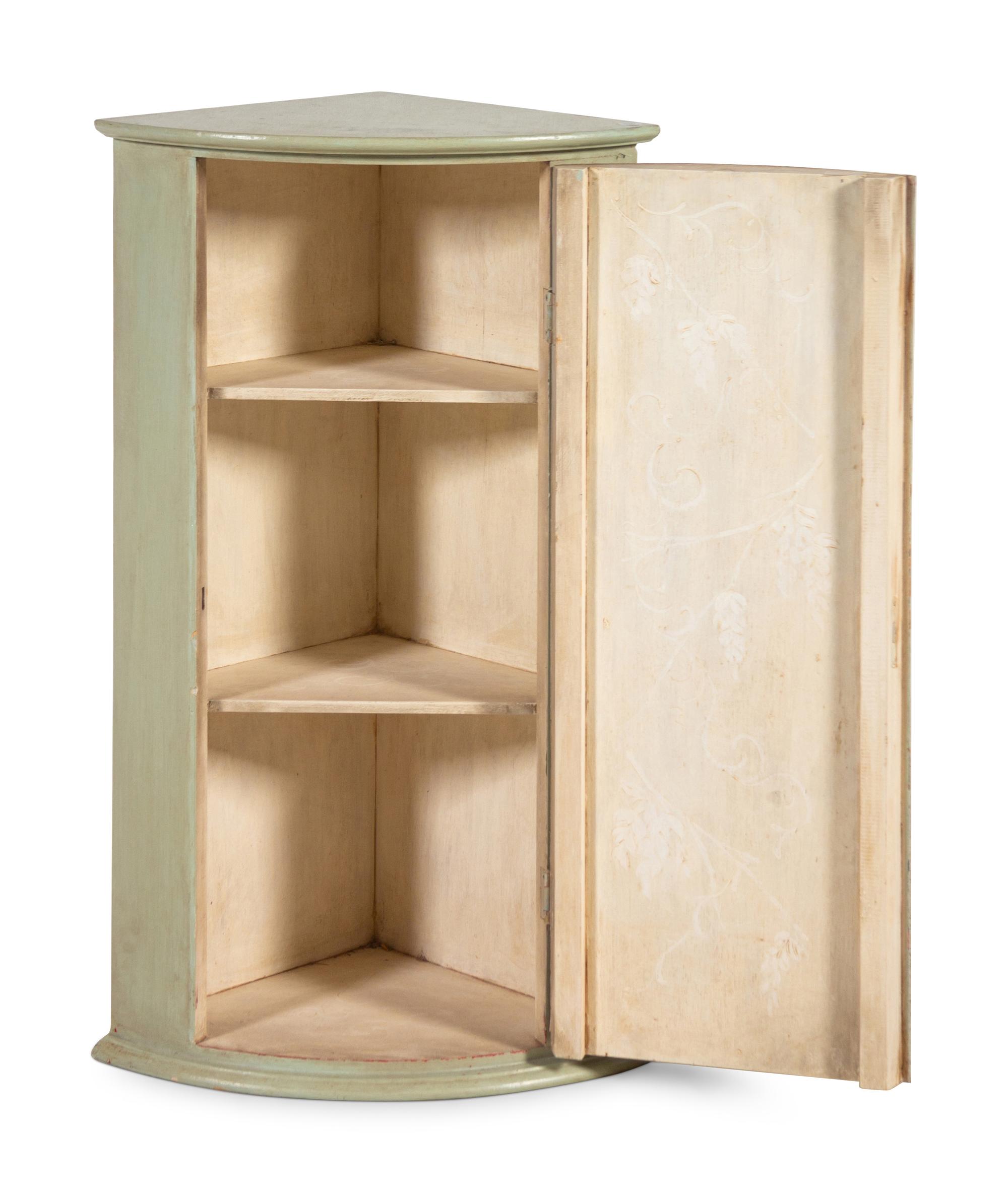 A Continental Painted Hanging Corner Cabinet