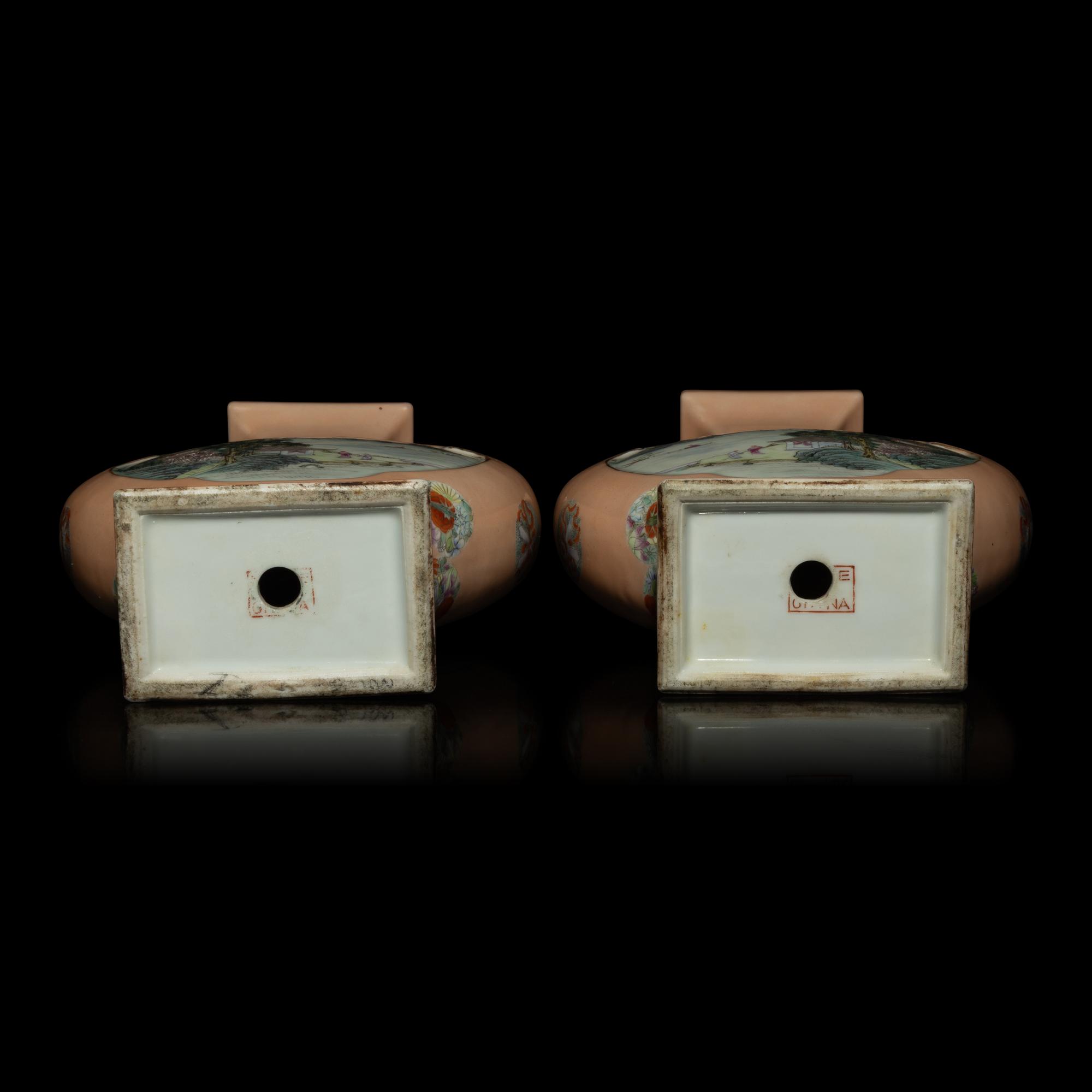 A Pair of Chinese Apricot Ground Famille Rose Porcelain 'Landscape' Vases, 20th Century — 近代 杏子地粉彩開光山水圖瓶一對