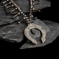 Sadie Randolph (Diné, 20th century) — Silver and Turquoise Squash Blossom Necklace