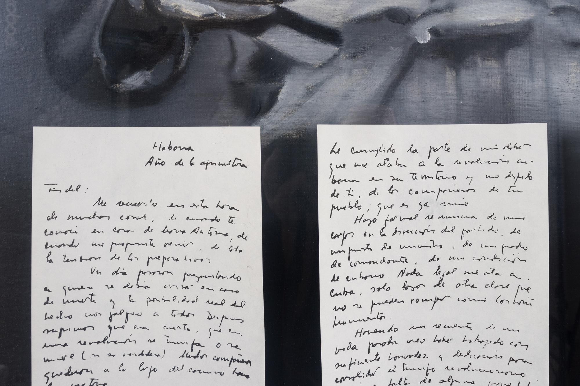 Fidel Castro reading letters sent to him by Che Guevara