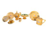 A Hutschenreuther Gilt Porcelain Dinner Service