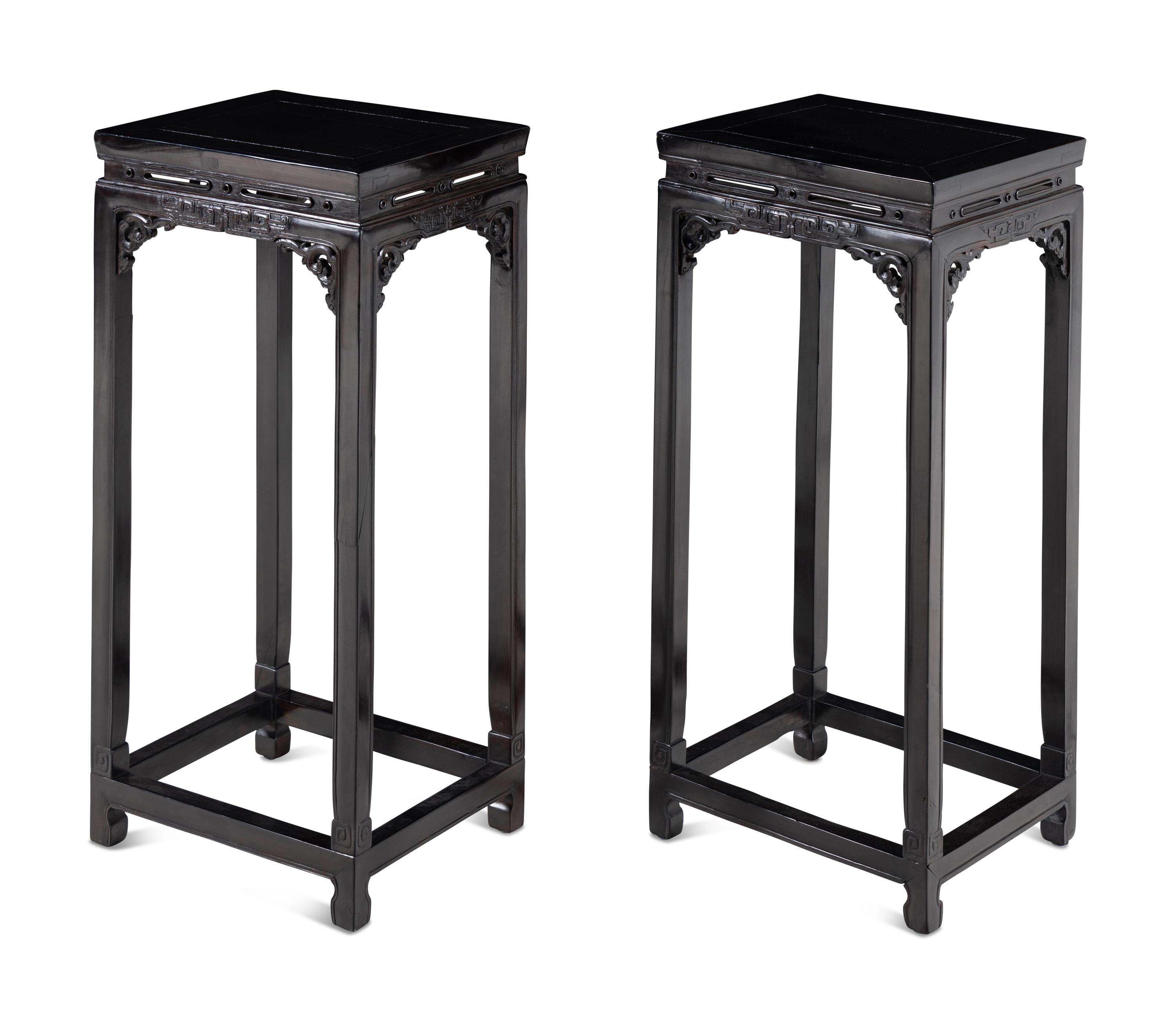 A Pair of Chinese Hardwood Pedestal Tables