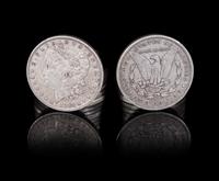 A Group of Thirteen United States 1884 Morgan Silver Dollar Coins