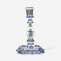 A Chinese Export porcelain blue and white candlestick with gilt decoration and pair of shell-form salts circa 1740-1755