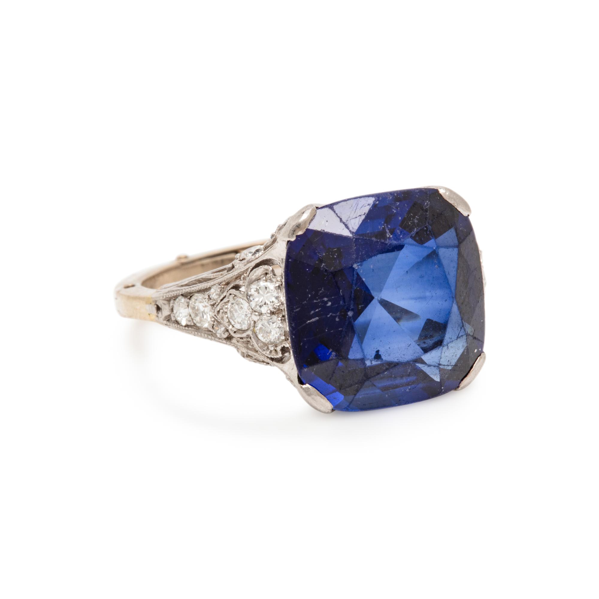 SYNTHETIC SAPPHIRE AND DIAMOND RING AND UNMOUNTED BLUE TOPAZ