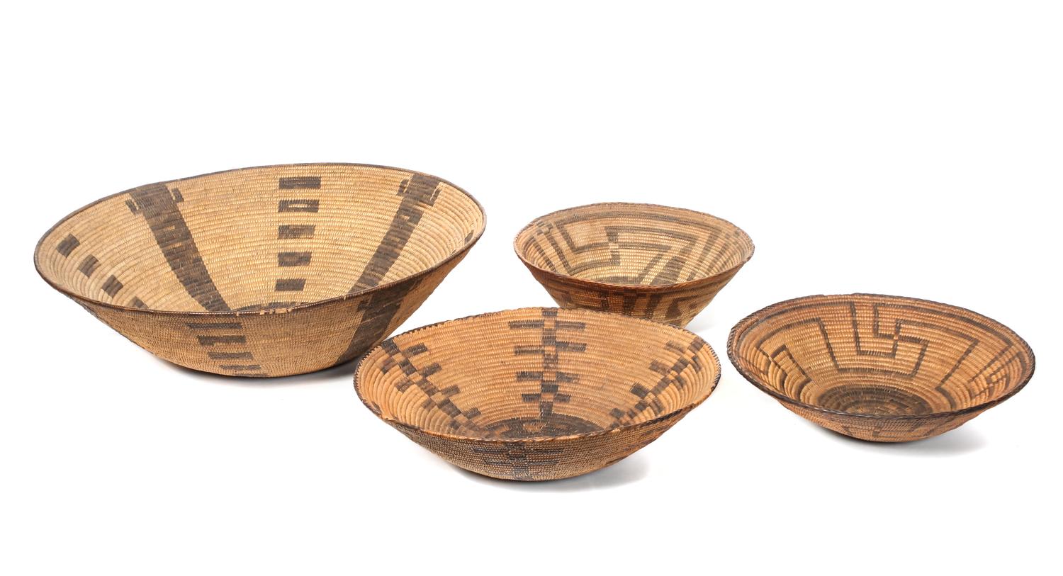 Four California Baskets Height of largest 5 1/2 x diameter 19 inches