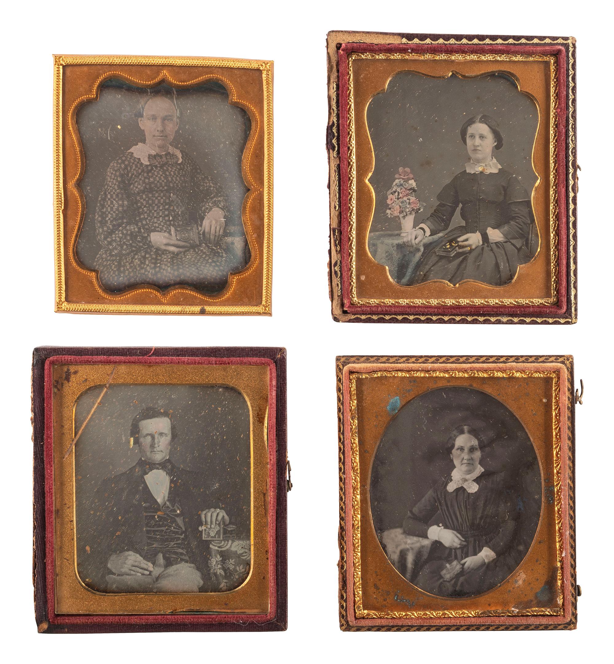 [EARLY PHOTOGRAPHY]. A group of 23 daguerreotypes featuring subjects posed with cased images, including: