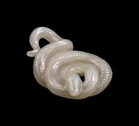 A Chinese Pale Celadon Jade Carving of a Snake