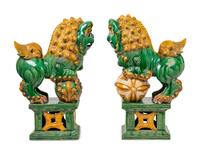 A Pair of Chinese Sancai Glazed Porcelain Figures of Fu Lions