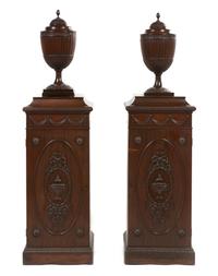 A Pair of George III Style Mahogany Pedestals and Cutlery Urns, Height overall 66 inches.