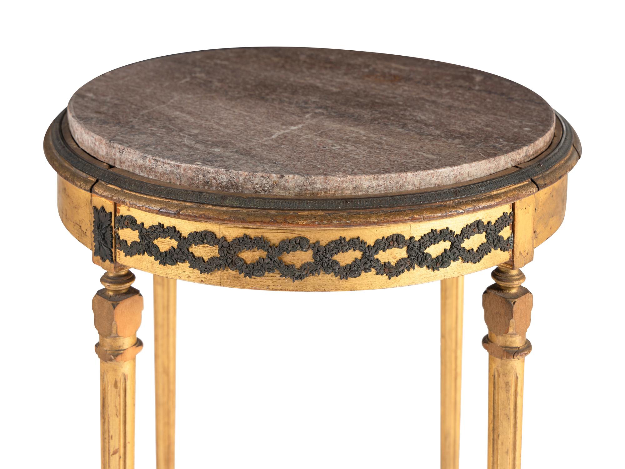 An Continental Gilt and Parcel Ebonized End Table