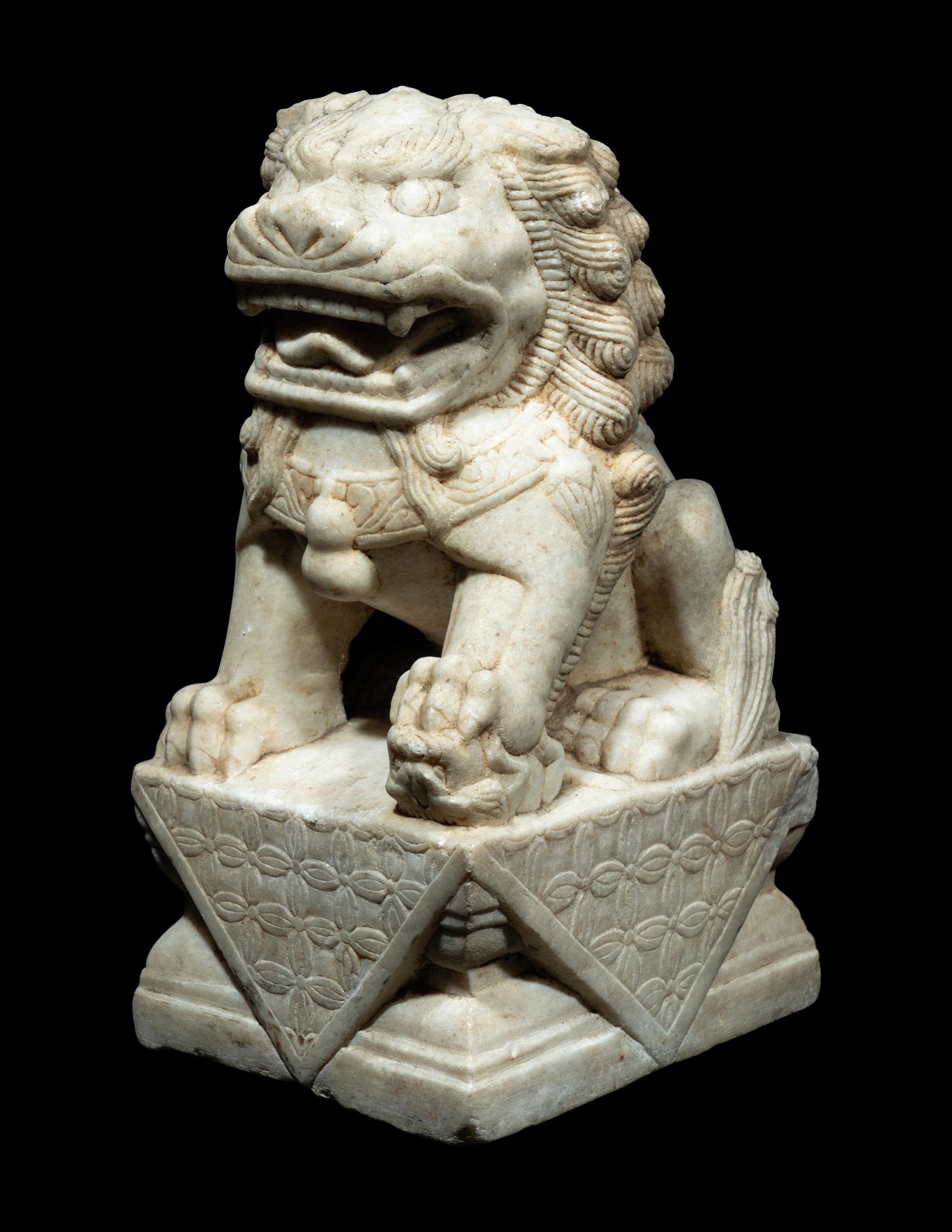 A Chinese Carved White Mable Figure of Fu Lion