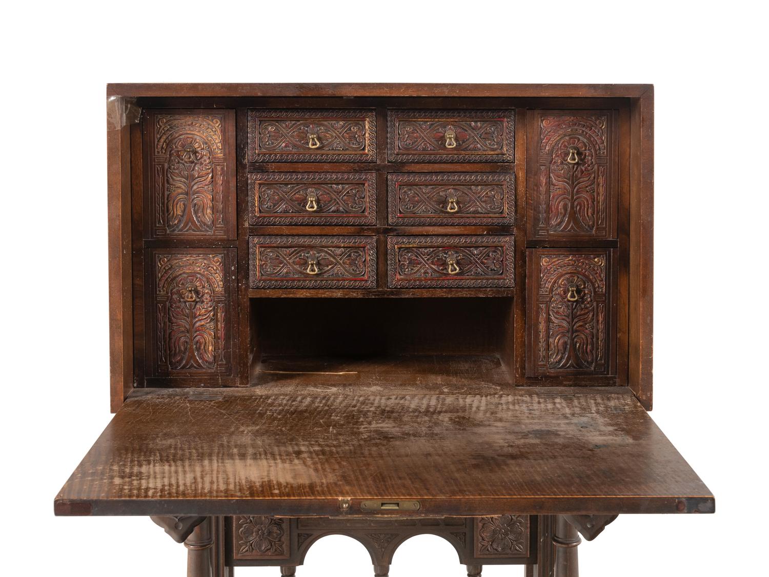 A Spanish Baroque Style Walnut Vargueño and Stand