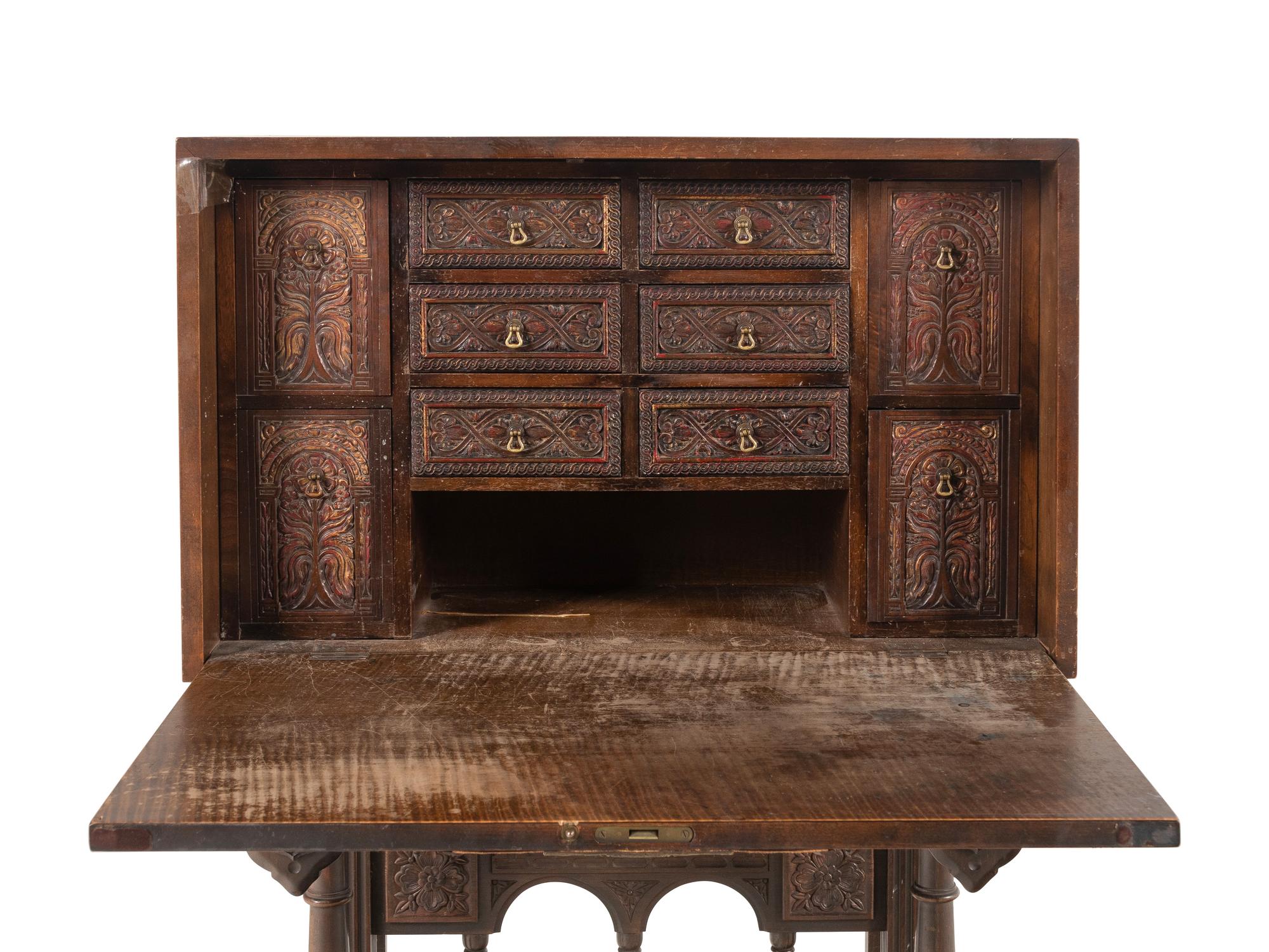 A Spanish Baroque Style Walnut Vargueño and Stand