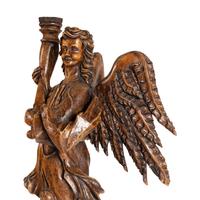 A Pair of Monumental Carved Walnut Figural Torchères
