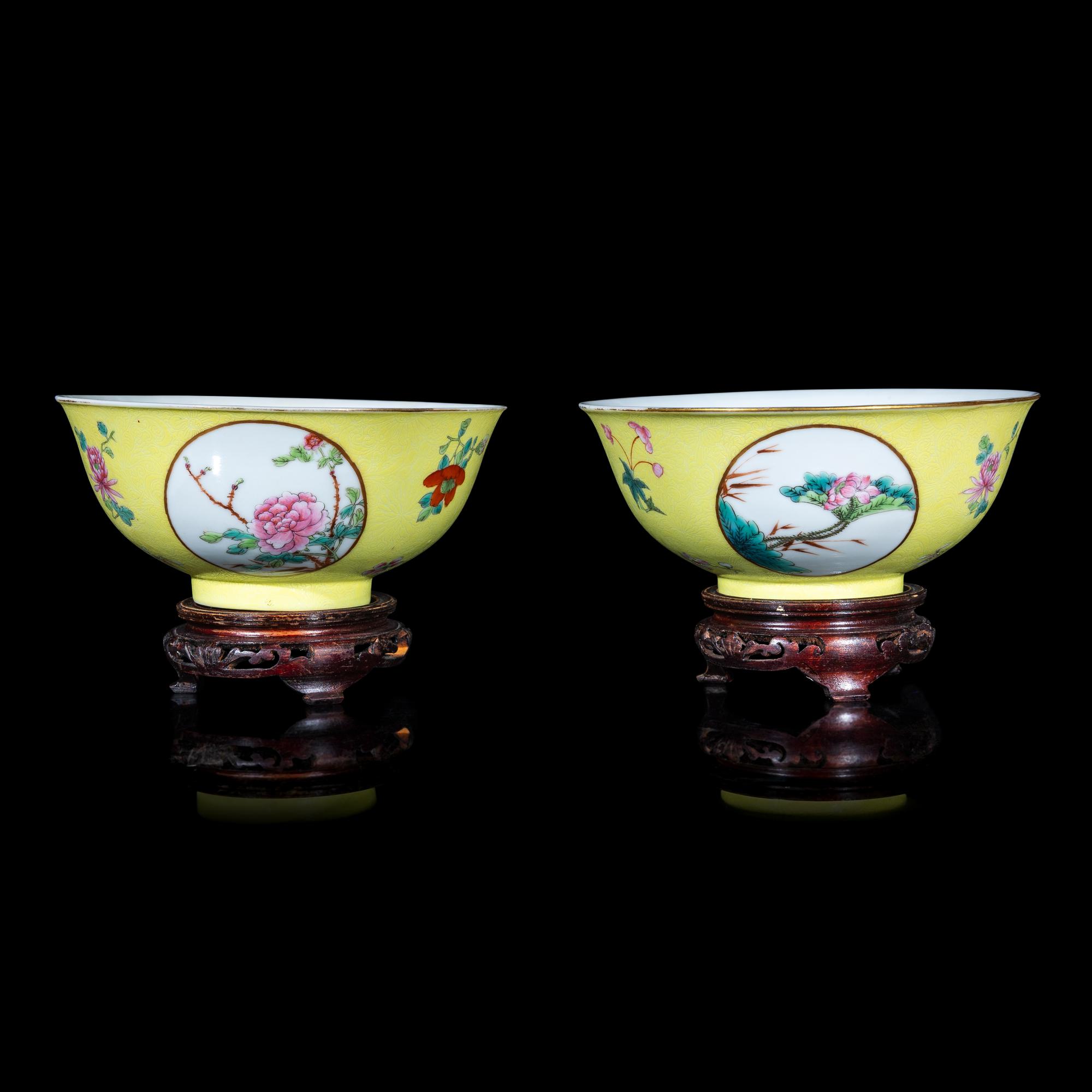A Pair of Chinese Sgraffito Ground Yellow Glazed Famille Rose Porcelain 'Floral' Bowls, Late 19th/early 20th Century 晚清/民國 黃地軋道開光花卉紋碗一對