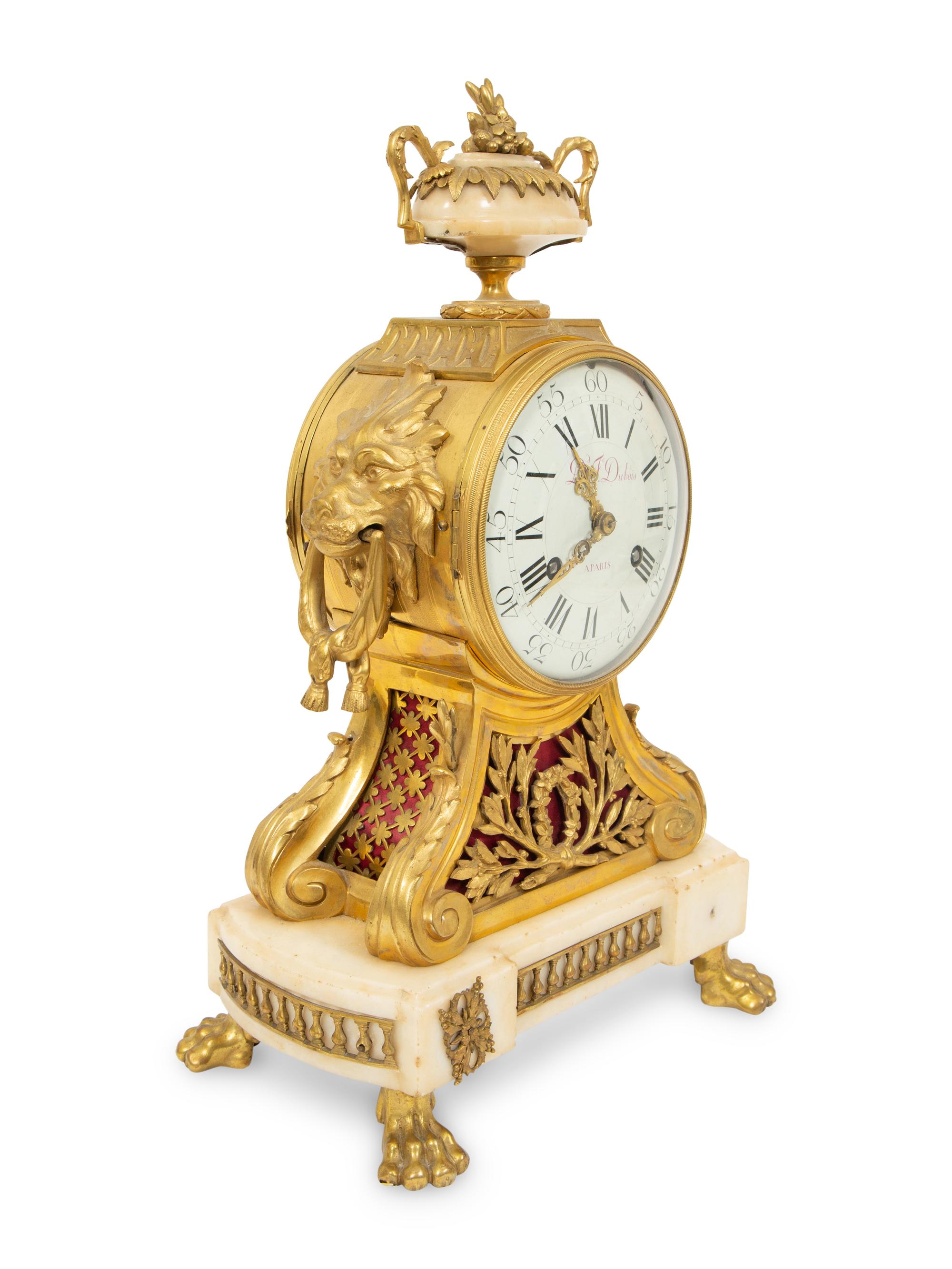 A Louis XVI Gilt Bronze and Marble Mantel Clock
