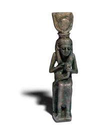 An Egyptian Faience Isis Nursing Horus Amulet