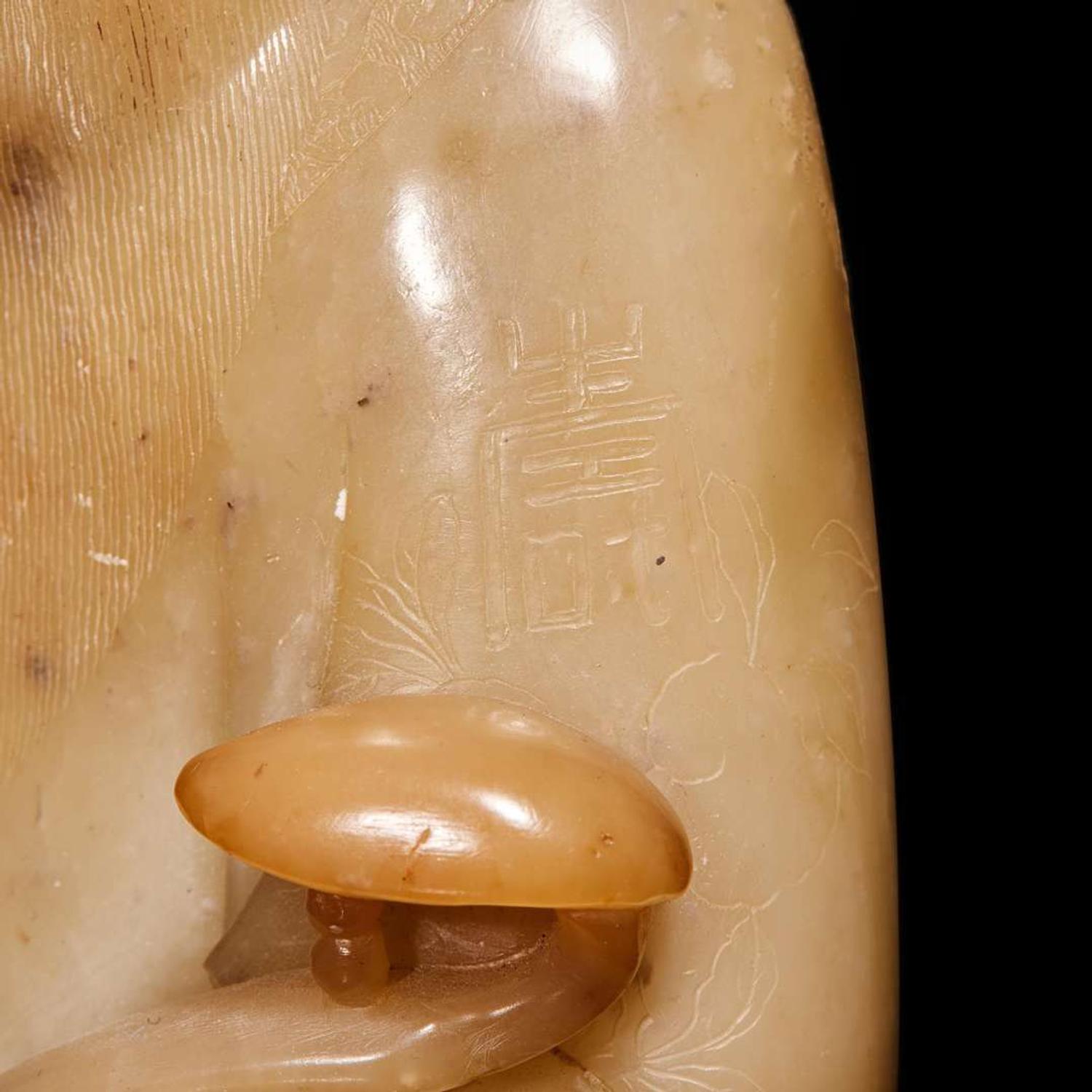 A Chinese carved soapstone figure of Shoulao 壽山石雕羅漢 Qing dynasty ?