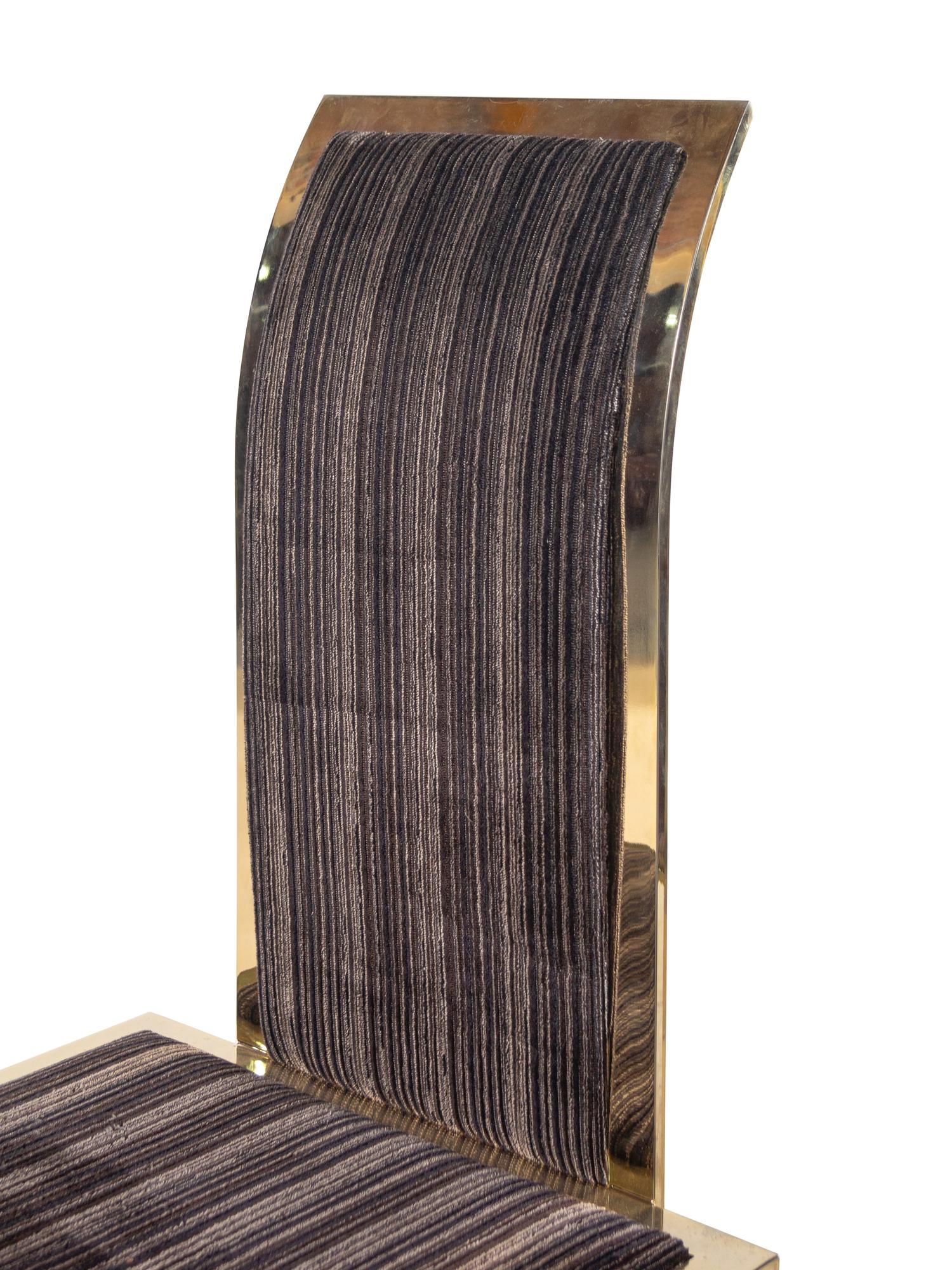 A Set of Four Brass Dining Chairs