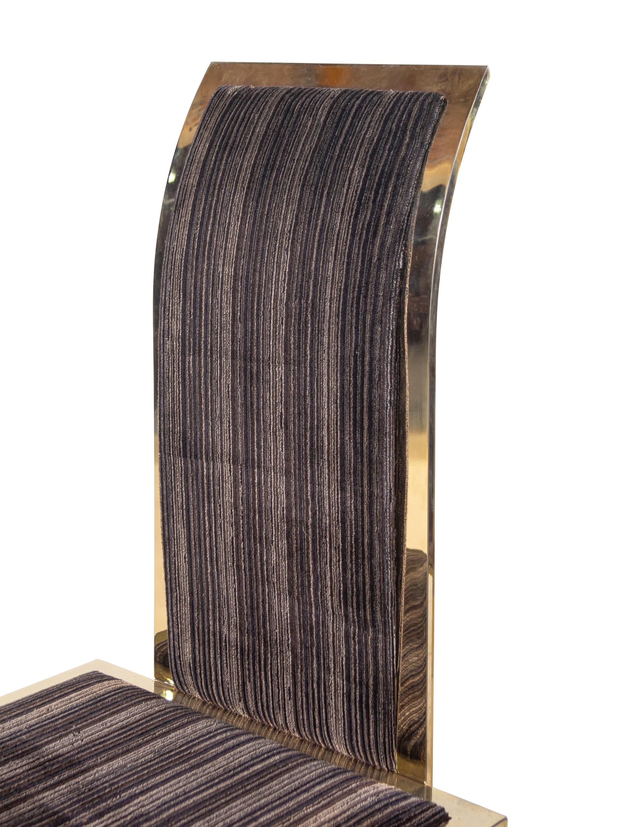 A Set of Four Brass Dining Chairs