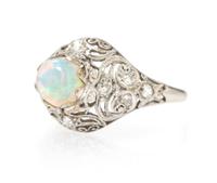 An Edwardian Platinum, Opal and Diamond Ring, 2.50 dwts.