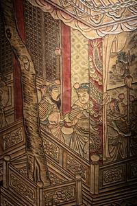 A Coromandel Lacquer Eight-Panel Floor Screen