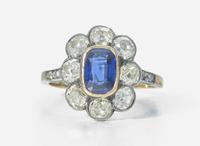 A 14K Yellow Gold, Sapphire, and Diamond Ring