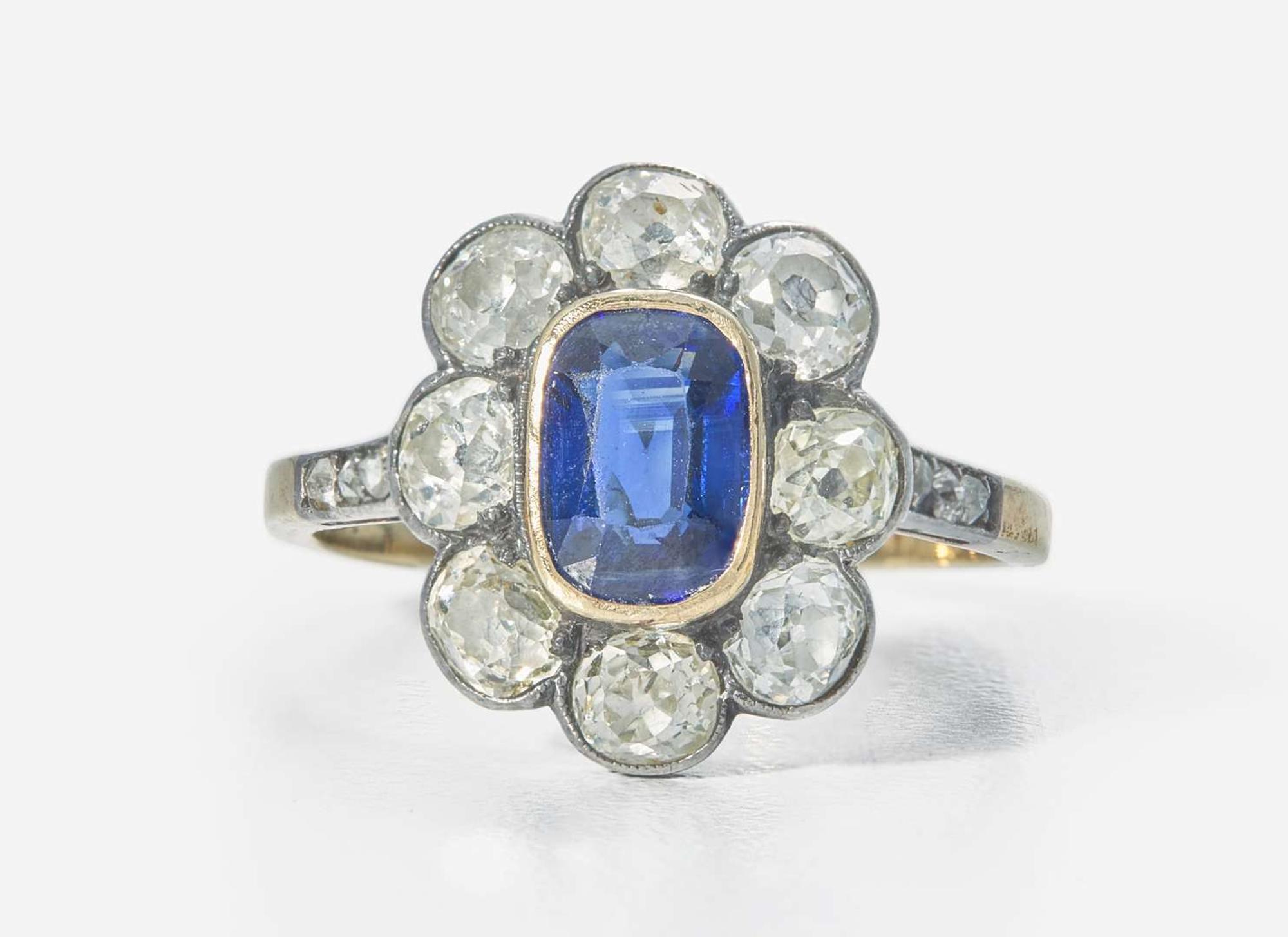 A 14K Yellow Gold, Sapphire, and Diamond Ring