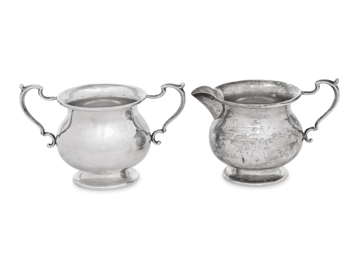 A Pair of English Silver Sauce Boats and an American Silver Sugar and Creamer Set