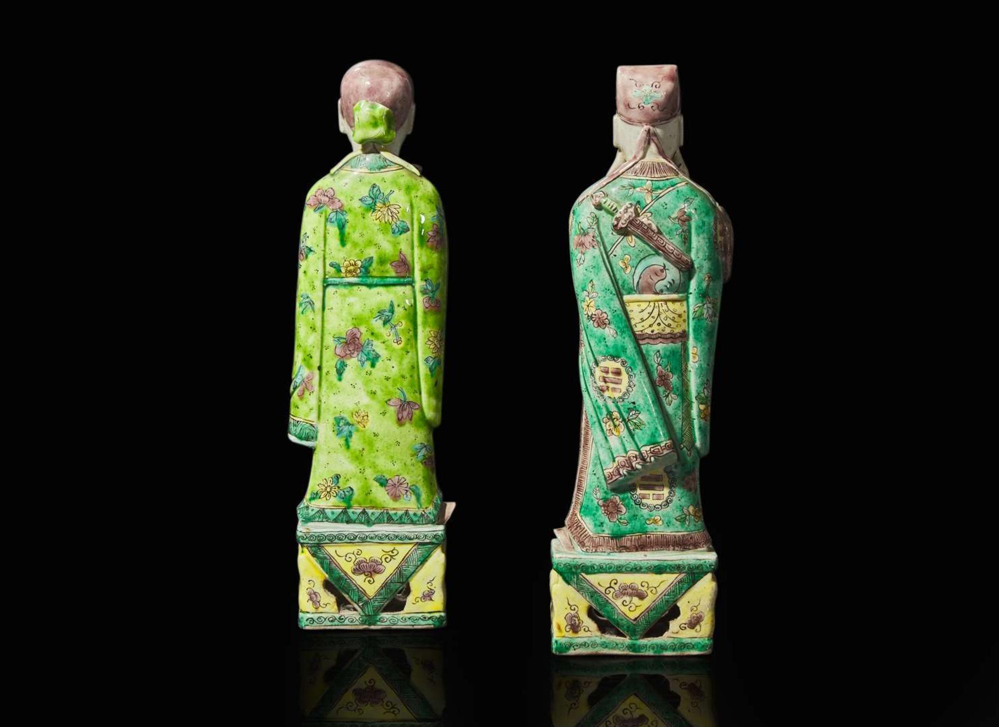 A pair of Chinese famille verte-decorated porcelain Daoist immortals