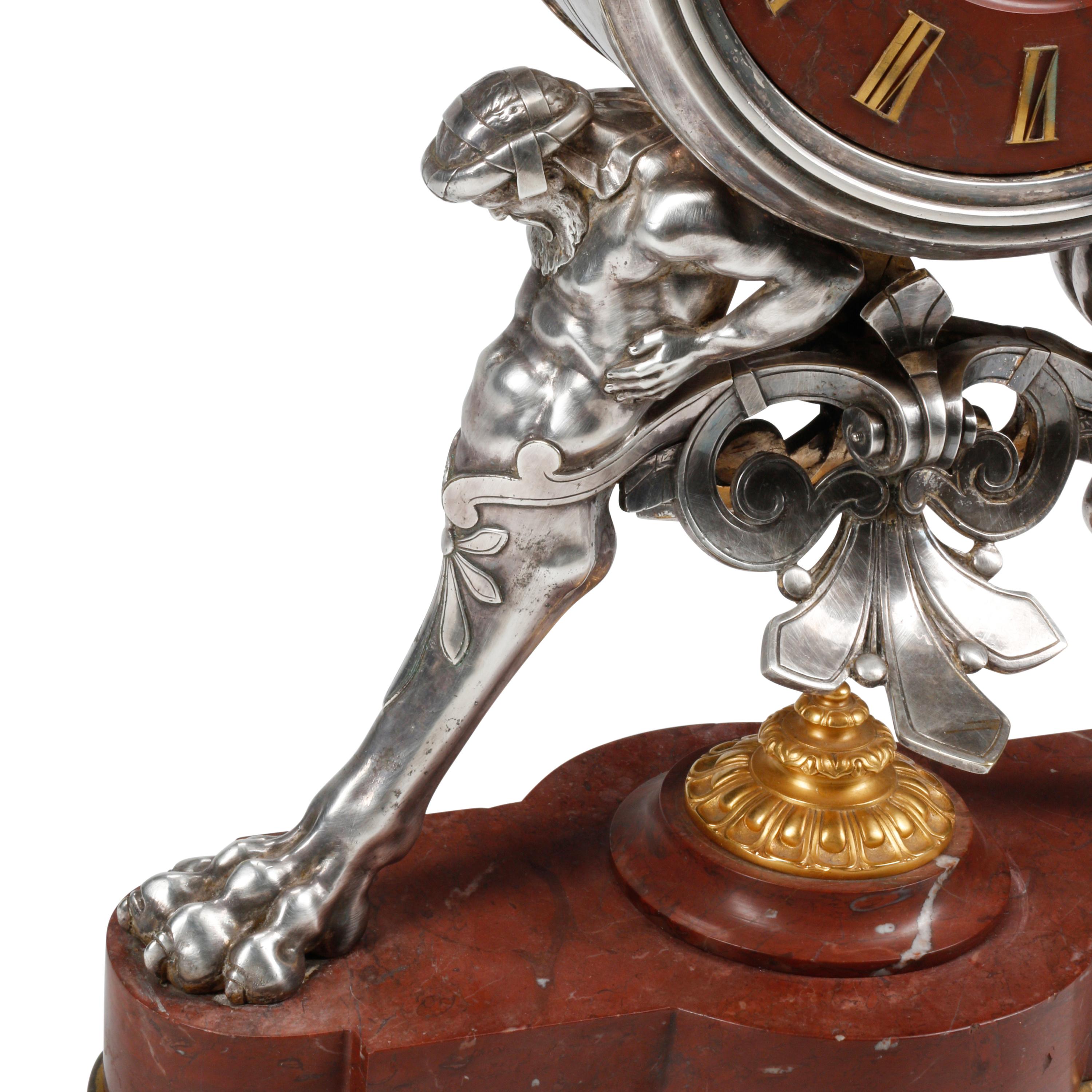 A French Neoclassical Silvered and Gilt Bronze and Red Marble Clock