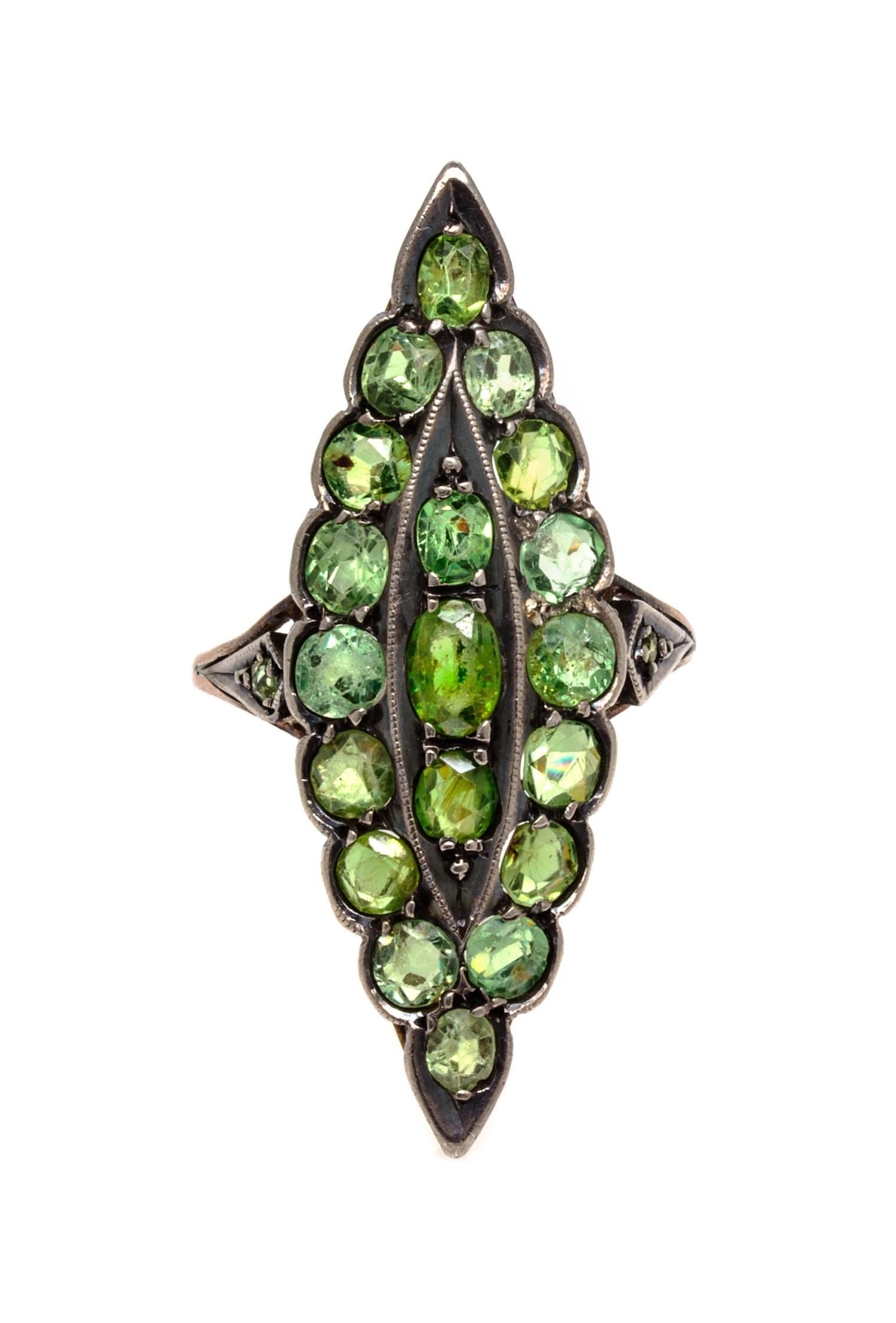 A Silver Topped Gold and Demantoid Garnet Ring, Circa 1900, 2.90 dwts.