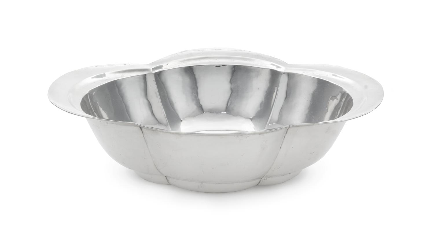 An American Silver Bowl, Cellini Craft, Ltd., Chicago, IL, 1920, of elongated quatrefoil form with deep lobed sides and a spot-hammered