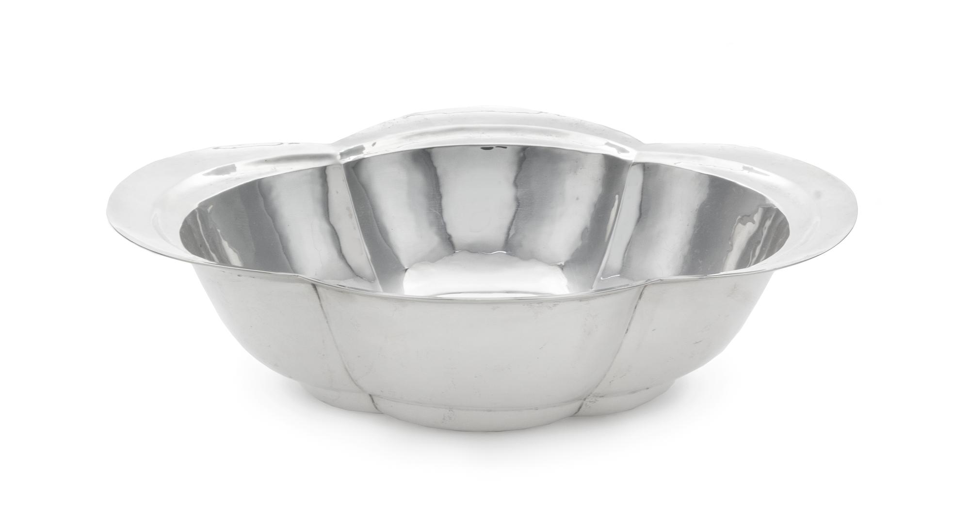 An American Silver Bowl, Cellini Craft, Ltd., Chicago, IL, 1920, of elongated quatrefoil form with deep lobed sides and a spot-hammered