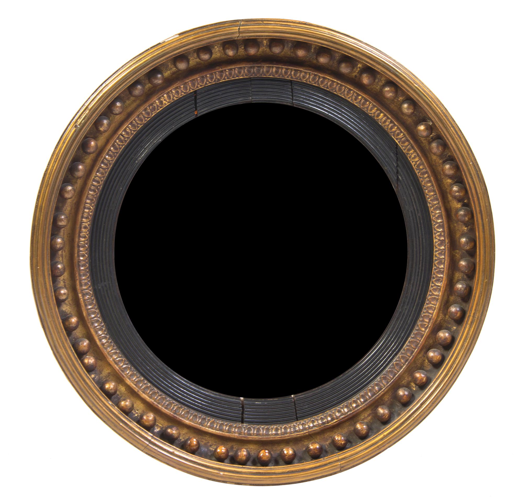 An Ebonized and Parcel Gilt Bullseye Mirror, Diameter 26 1/4 inches.