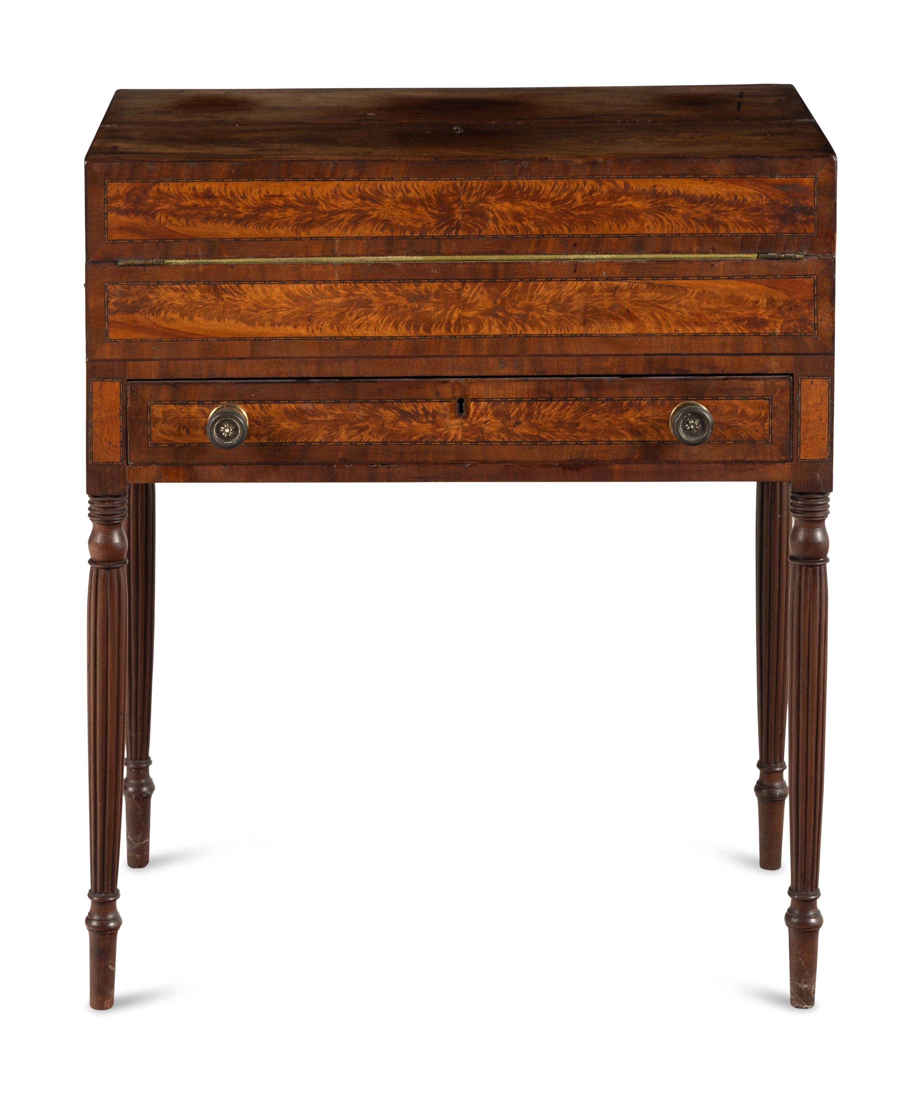 A Late Federal Brass-Mounted Mahogany and Maple Campaign Desk