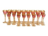A Set of Bohemian Gilt Decorated Glass Stemware
