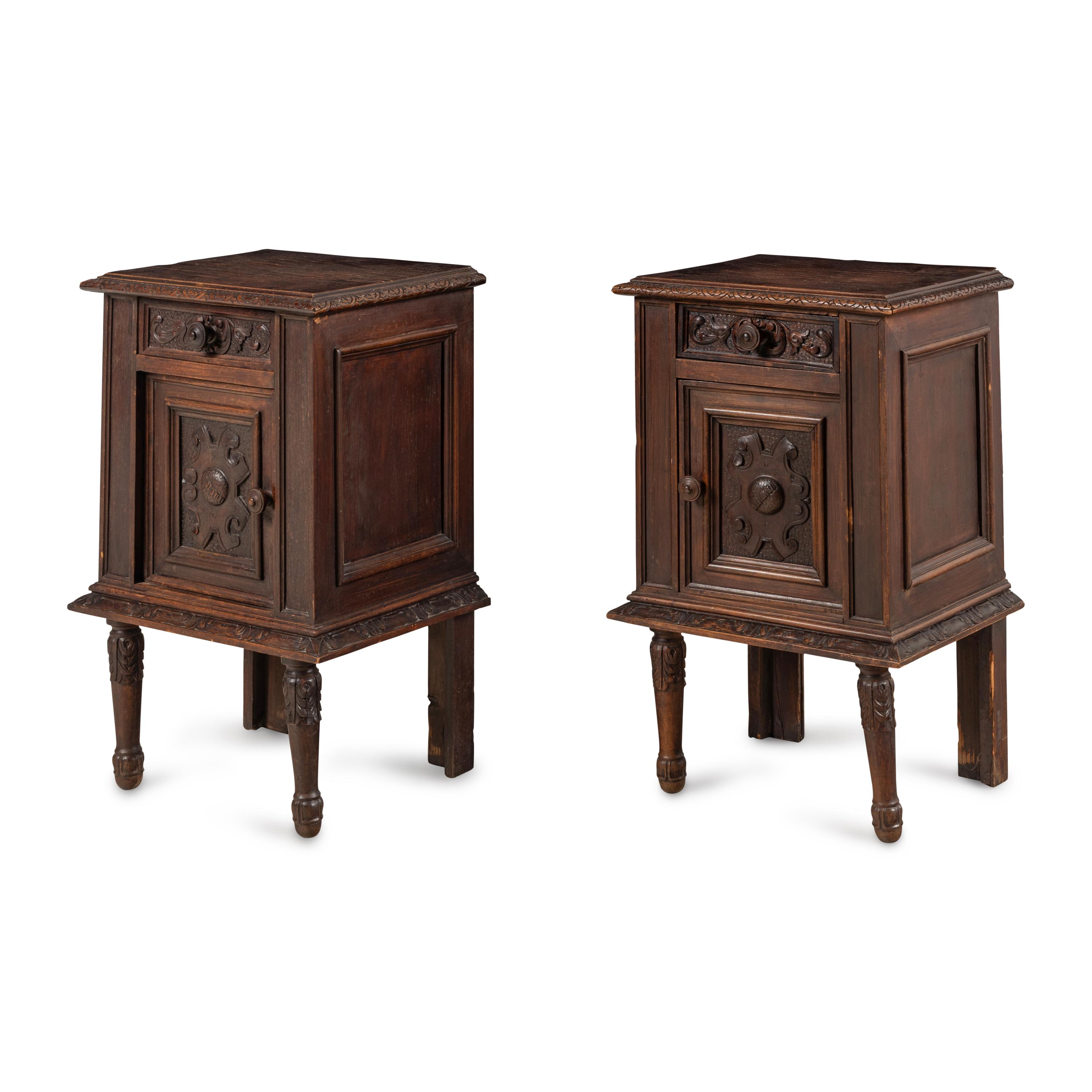 A Pair of Spanish Carved Oak Side Cabinets